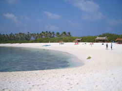 Image of pristine white coral sands and turquoise water